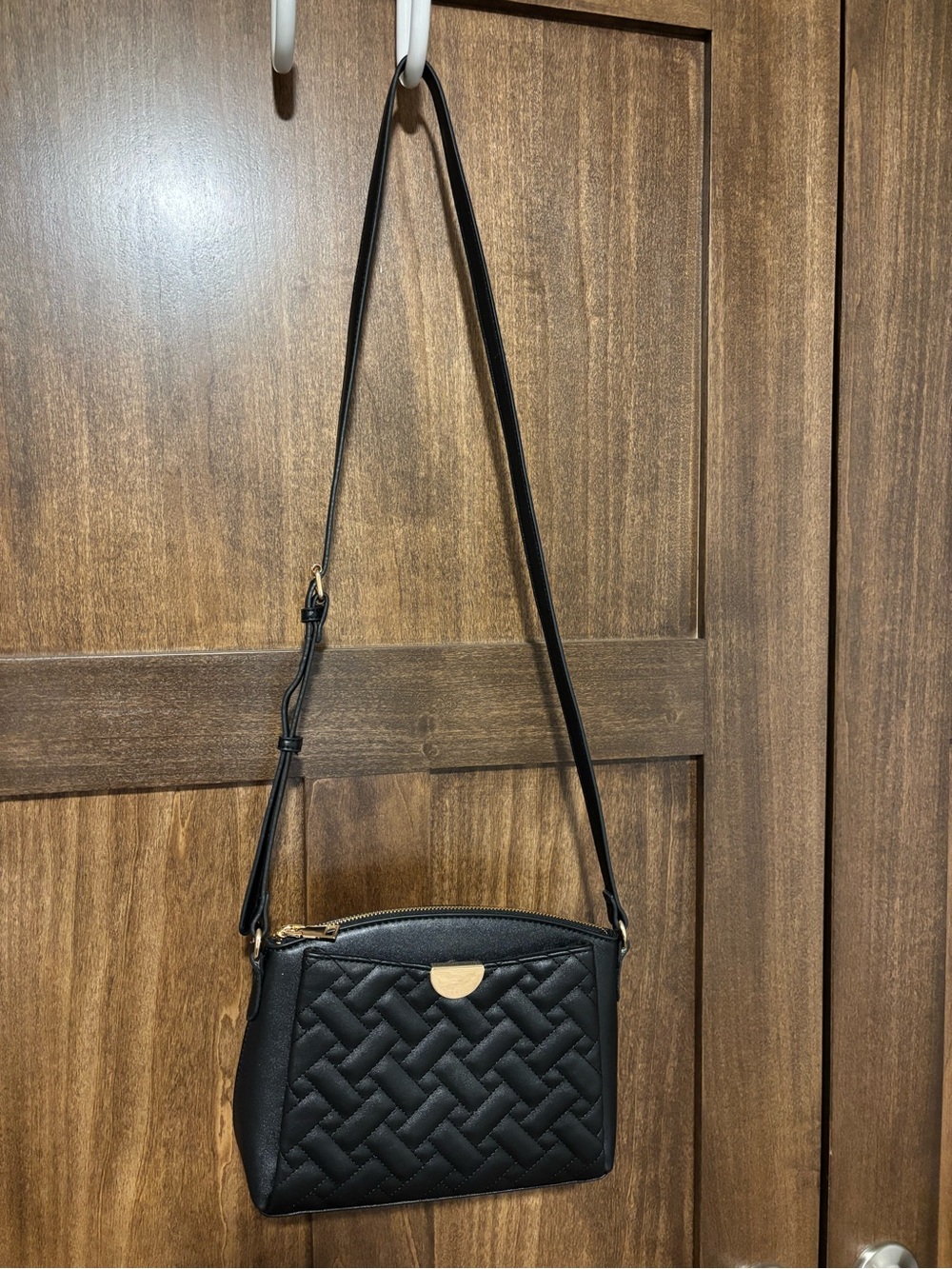 Black Crossbody Bag with Gold Accent